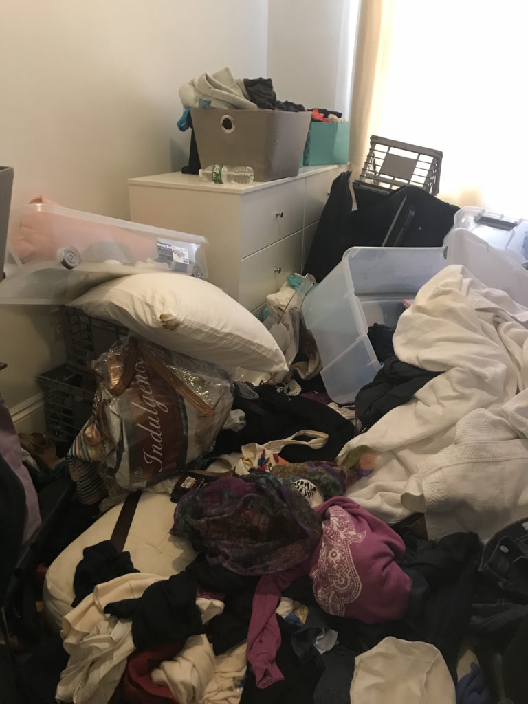 Cluttered room on The Clutter Queen of Boston website