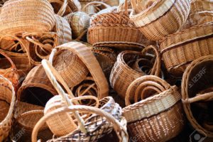 A pile of baskets with clutter